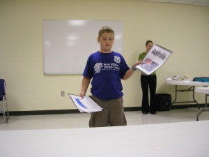 Noah giving a report on Australia at the Homeschool Hour at the library.